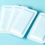 Patches with nanoneedles for painless diagnostics, featuring a sleek design with light blue and white colors.